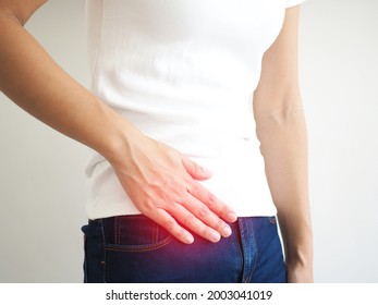 Woman with abdominal pain appendicitis. medical concept. closeup photo, blurred.