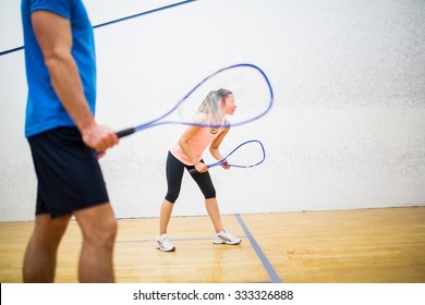 squash serve ball woman court shutterstock