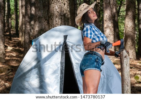 Similar – Image, Stock Photo Woman standing in ladder opening tent over car