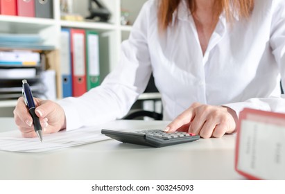 Woman Accountant Working On Financial Results