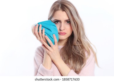 Woman With Aching Jaw Holding An Icepack Isolated