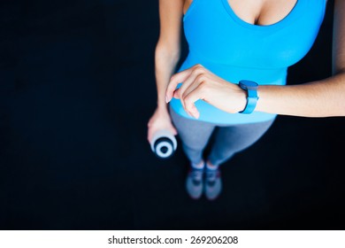 Woman With Activity Tracker And Shaker