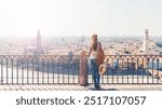 Woman Admiring the Panoramic View of Florence, Italy from a Scenic Viewpoint- Firenze