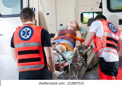 Woman after accident in ambulance, horizontal