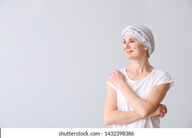 Woman After Chemotherapy On Light Background