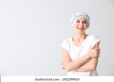 Woman After Chemotherapy On Light Background