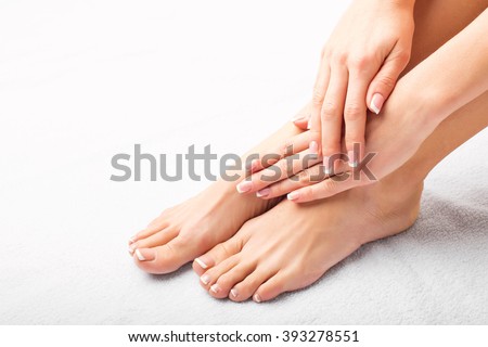 Woman after manicure and pedicure 