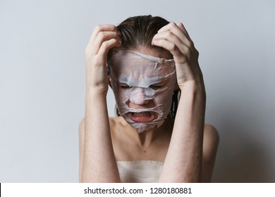 woman after a shower with a towel on the body on the face                                - Shutterstock ID 1280180881