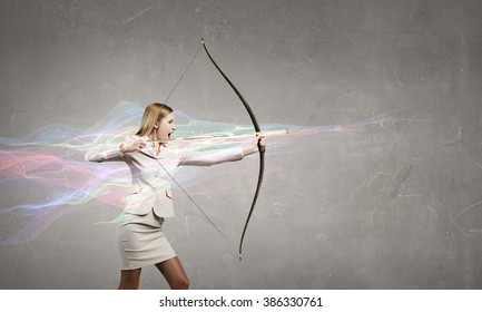 Woman aiming her goal