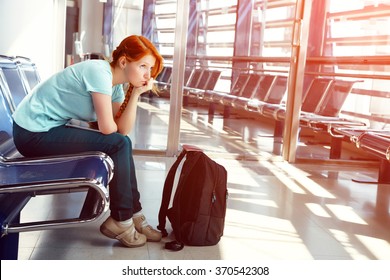 Woman At The Airport. Waiting Hall. Flight Delay