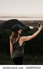 Woman Alone Taking Selfie Top Hill Sunset Golden Hour