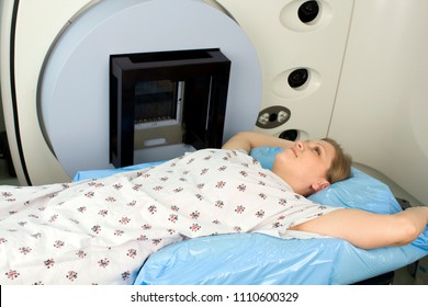 Woman In Alpha Cradle Receiving Radiation Therapy Treatments For Breast Cancer