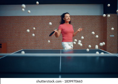 Woman Among Flying Ping Pong Balls, Table Tennis