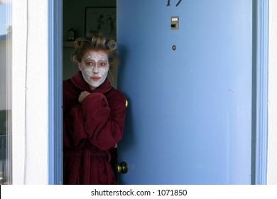 Woman Answering Door Unprepared