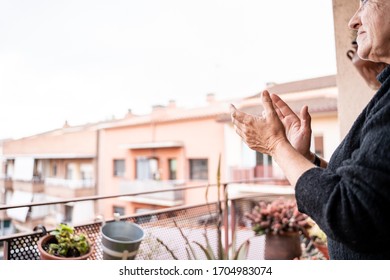 Woman Applauding In Spain For Congratulating Health Workers During The Covid Coronavirus Crisis19