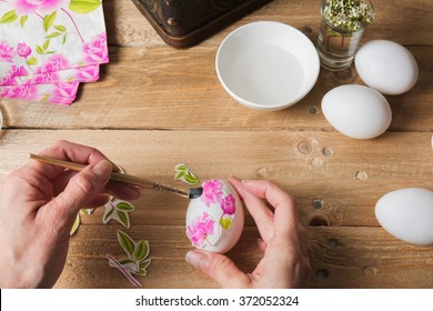 Woman Apply  Glue On Colored Easter Egg, With The Technique Of Decoupage