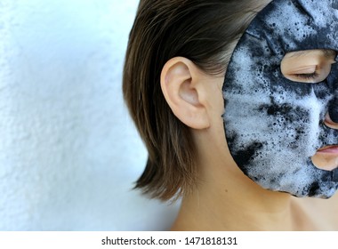 Woman Applying Bubble Charcoal Sheet Mask. Face Treatment. Popular Korean Cosmetics.Oxygen Mask.