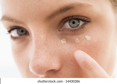 Woman Applying Concealer