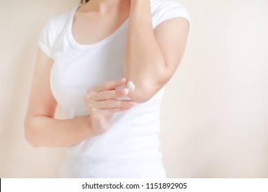 Woman Applying Elbow Cream,lotion , Hygiene Skin Body Care Concept.