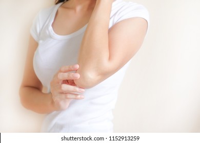 Woman Applying Elbow Cream,lotion , Hygiene Skin Body Care Concept.