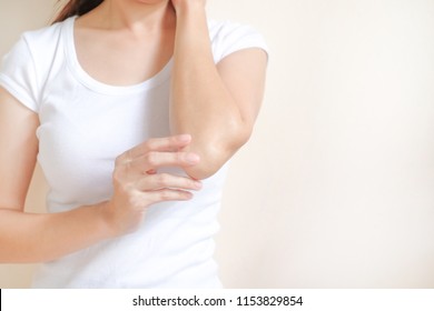 Woman Applying Elbow Cream,lotion , Hygiene Skin Body Care Concept.