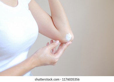 Woman Applying Elbow Cream,lotion , Hygiene Skin Body Care Concept.