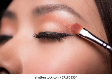 Woman Applying Eyeshadow. Makeup. Make-up. Eyeshadows. Eye Shadow Brush