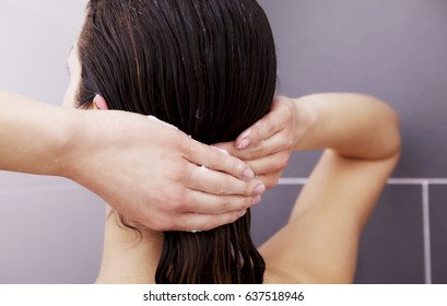 Woman Applying Hair Conditioner Or Mask.