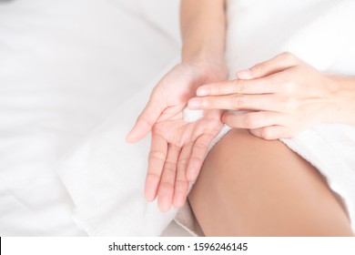 Woman Applying Moisturizing Cream/lotion On Hands, Beauty Concept.
