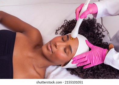 Woman Applying Plasma Jet On Her Face