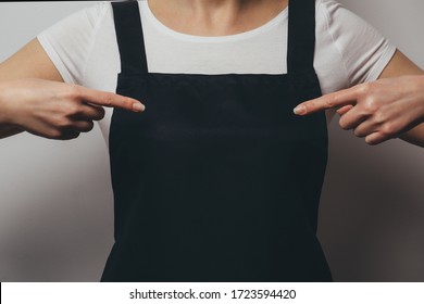 Woman In Apron Pointing Fingers Into Chest. Bakery, Chef, Cook Or Waiter Concept Mockup