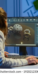 Woman Architect Working In Modern Cad Program Overtime Sitting At Desk In Start-up Business Office. Industrial Employee Studying Prototype Idea On Computer Showing Cad Software On Device Display