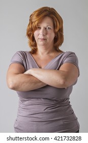 Woman With Arms Crossed, With An Angry Stare