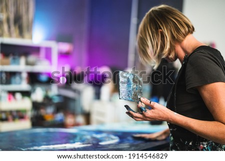 Similar – Image, Stock Photo Girl stiring coffee and looking her tablet