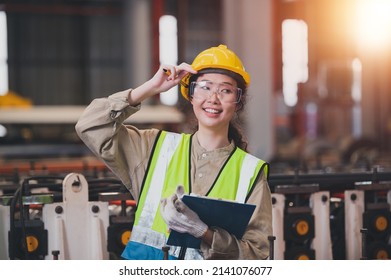 Woman Asian Engineer Working Control Machine In Factory.
Asia Women Worker Control Machine With Manufacturing Of Industry.