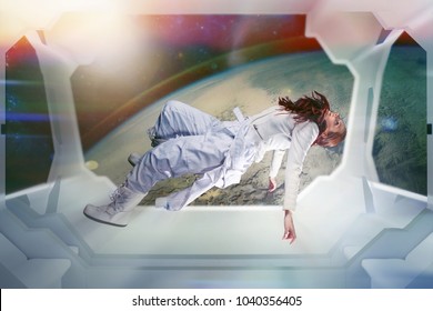 Woman Astronaut On A Futuristic Spaceship. Floating In Zero Gravity. Interior Of The Space Ship, Concept