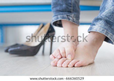 woman athlete foot close up with health concept