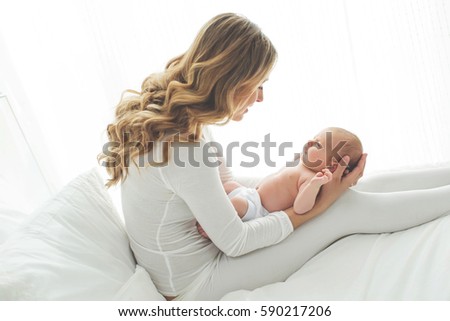 A woman with a baby 