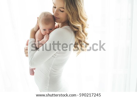 A woman with a baby 