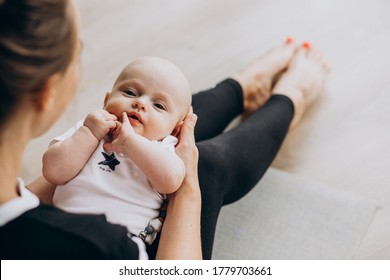 Woman With Baby Boy Practice Yoga