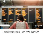 Woman, back and airport with flight schedule on board with information display for global immigration. Person, backpack and international travel with digital time table on screen, location or arrival