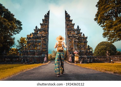 Woman with backpack exploring Bali, Indonesia. 