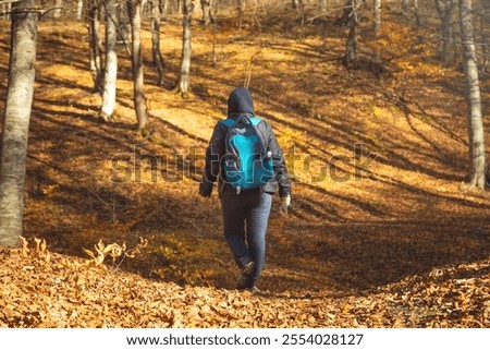 Similar – Young man running outdoors during workout in a forest