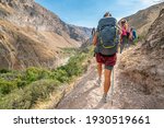Woman Backpacker Hikes Trail in Colca Canyon, Peru
