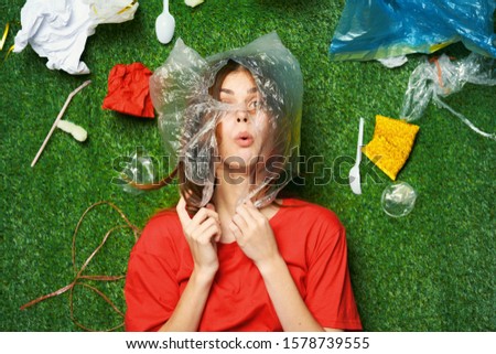 Similar – #A# Mankind suffocating in plastic waste