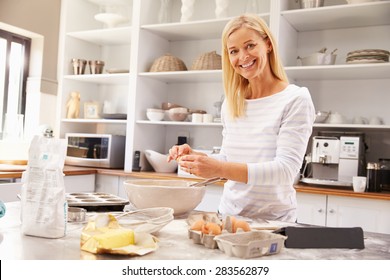 Woman Baking At Home