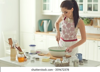 Woman Baking At Home