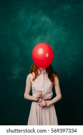 Woman With A Balloon For A Head