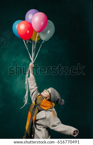 Similar – Young teenage girl blowing pink bubble gum