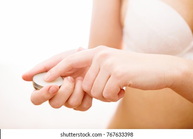 Woman And Balm On White Background, Girl In Underwear Takes Finger Balm For Body